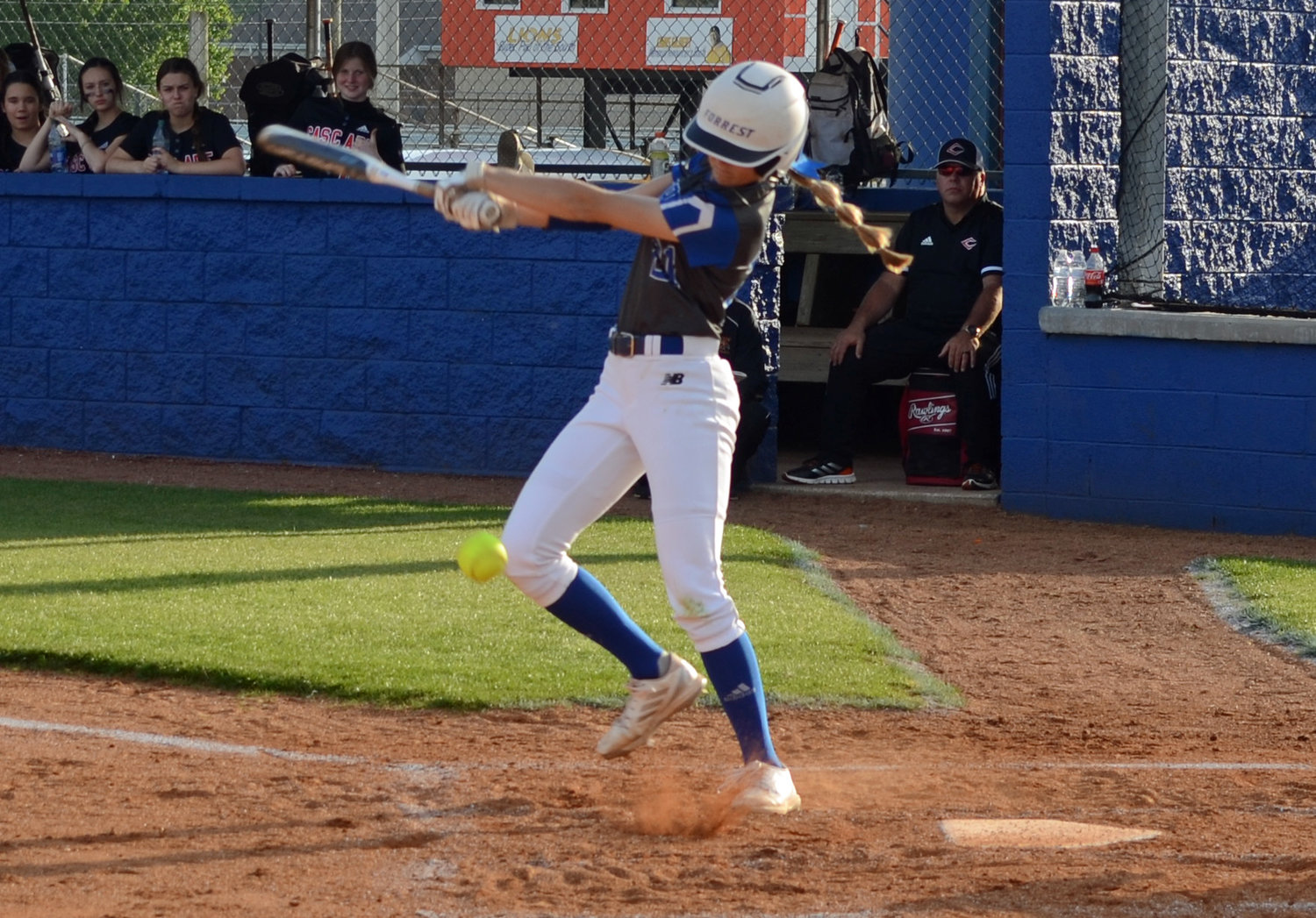 Maggie Daughrity executes the slap base hit in the bottom of the second inning.