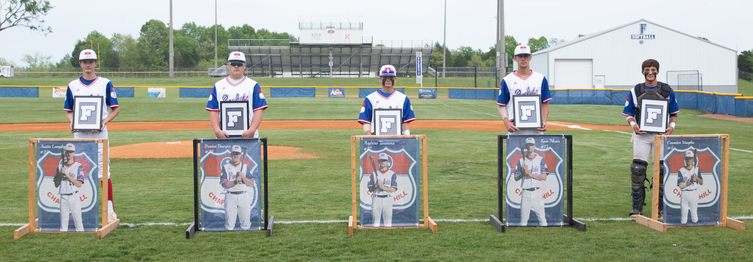 Prior to first pitch on Friday, Forrest honored seniors (from left) Austin Lampley, Braden Bowyer, Andrew Timmons, Kain Moses and Cam Vaughn.