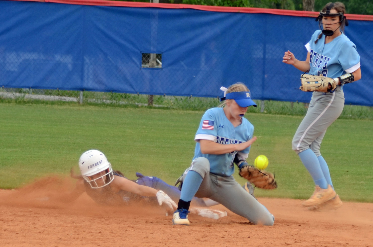 Addi Bunty steals second base in a cloud of dust in the second inning.