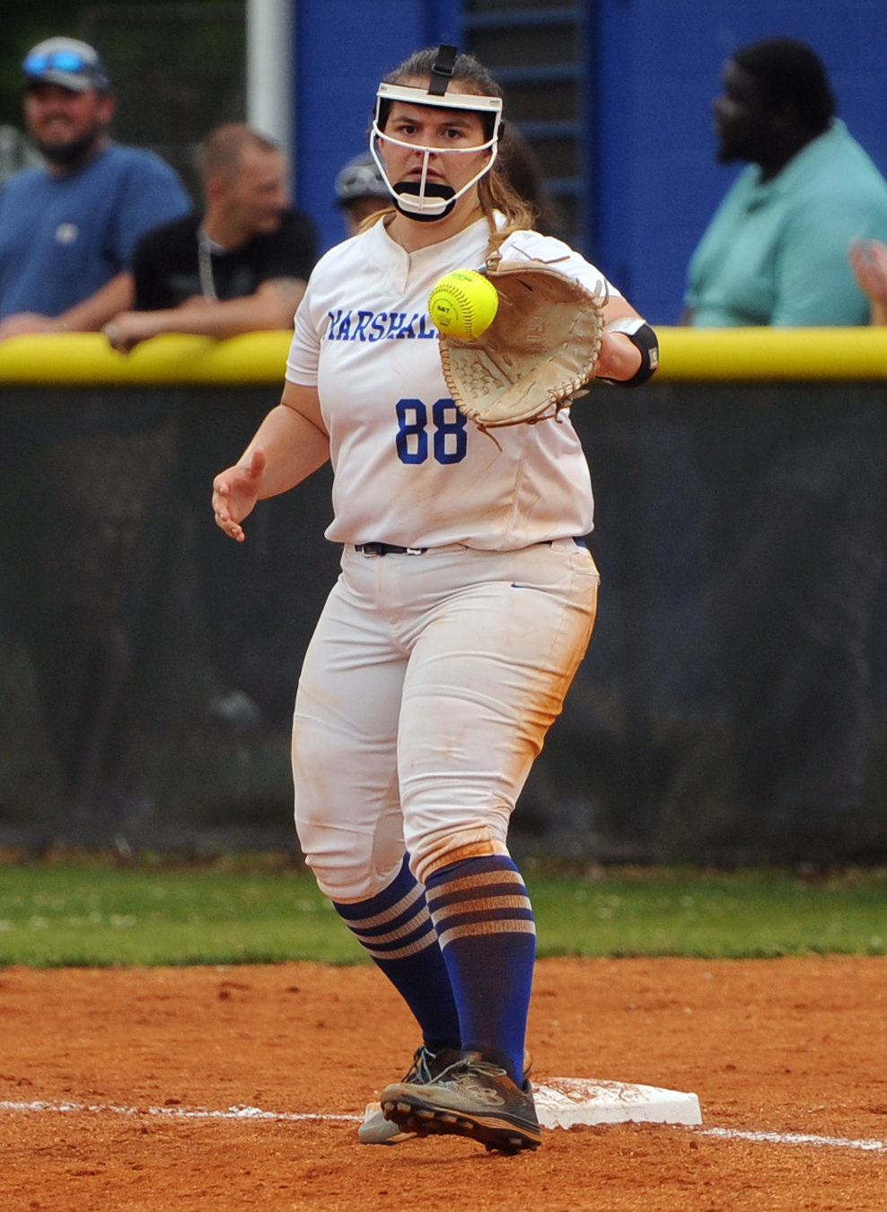First baseman Jahna Meadows-Richardson puts the squeeze on a throw for the out.