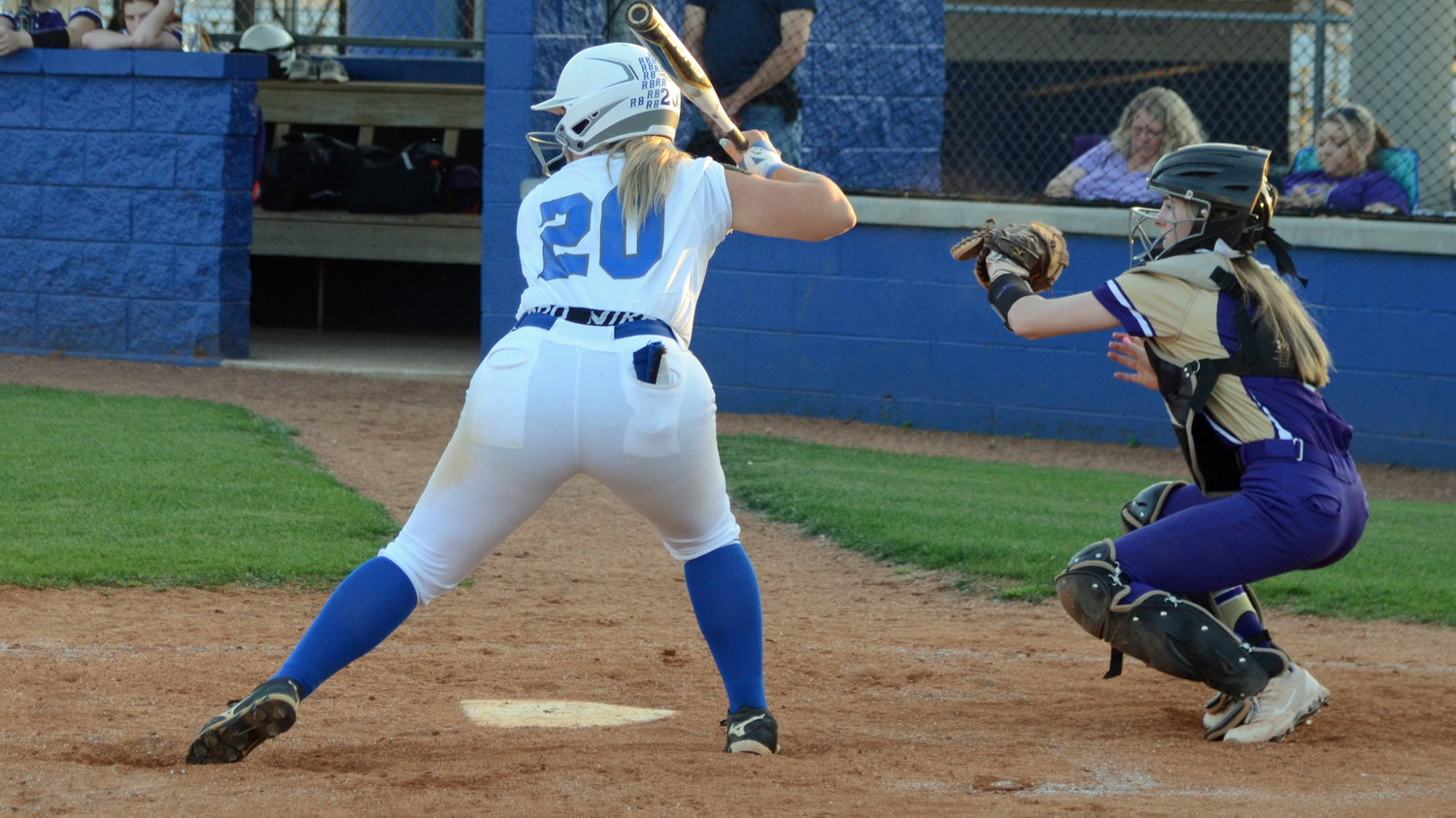 Leslie Bartoli strokes an RBI pinch-hit double in the third inning.