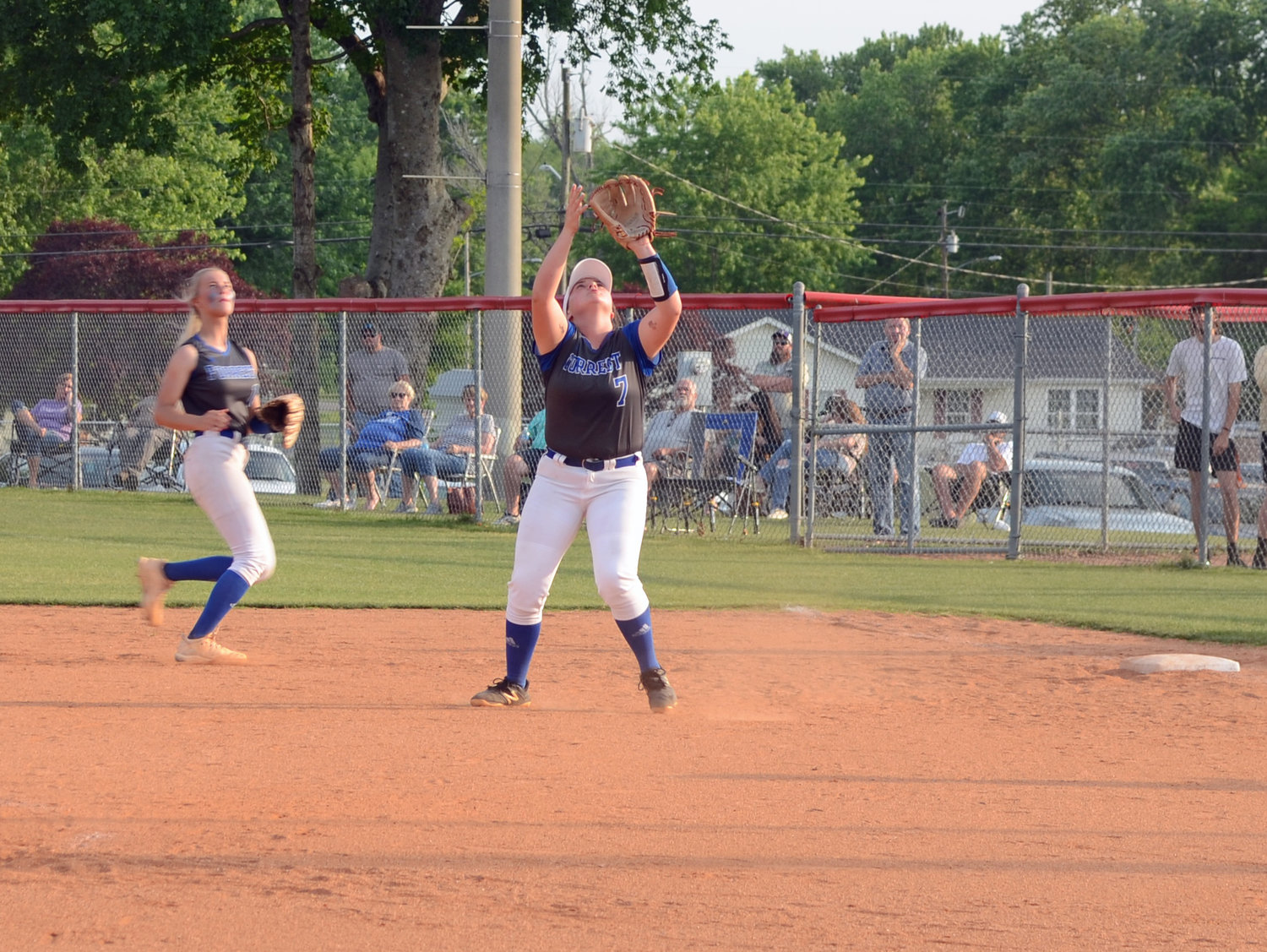 Carli Warner gets ready to catch a pop-up at first base in the third inning.