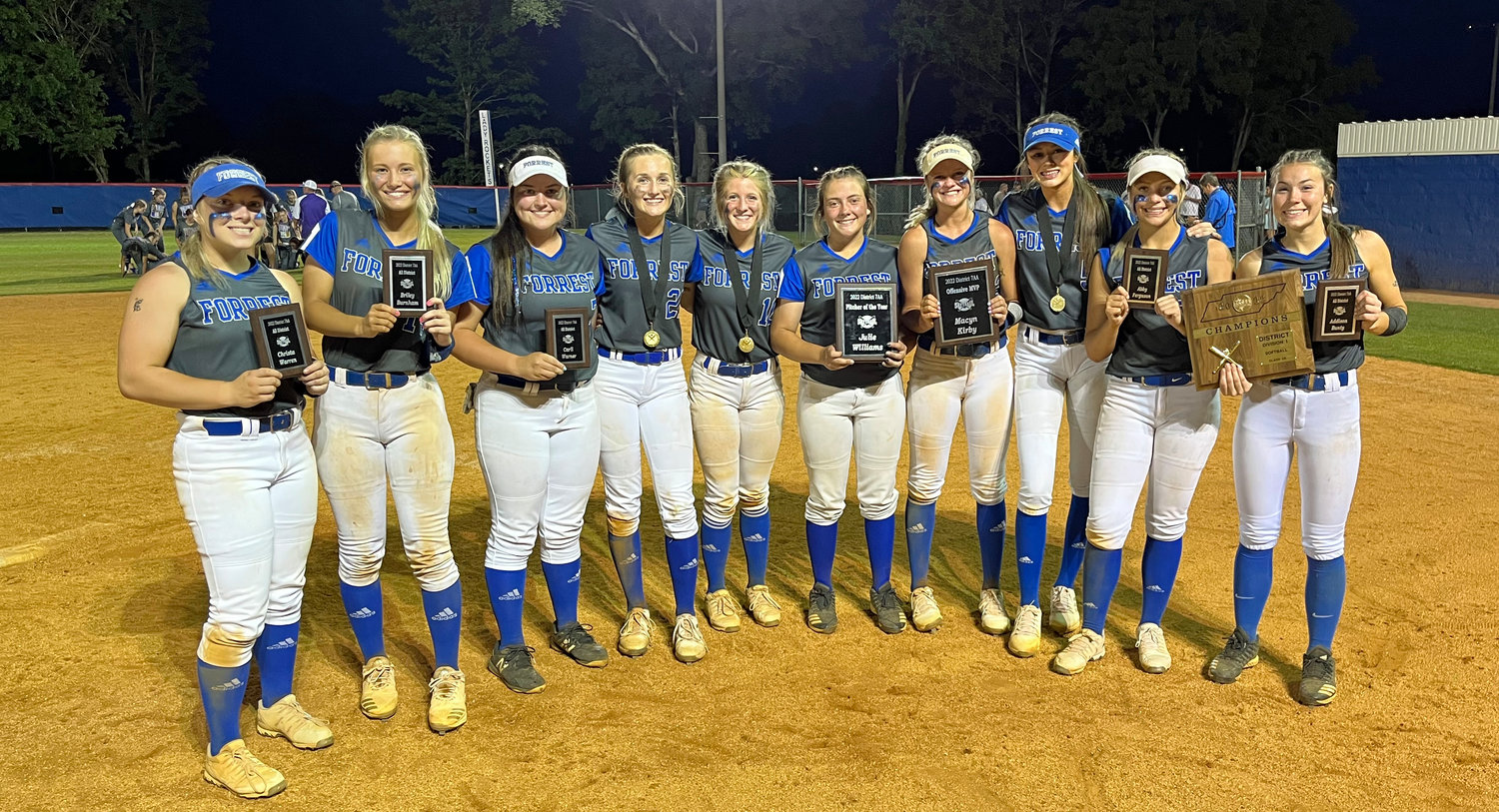 Forrest all-district award winners from left are, Christa Warren, Briley Burnham, Carli Warner, Maggie Daughrity, Parker Wales, Julie Williams (Pitcher of the Year), Macyn Kirby (Offensive Player of the Year), Ella Chilton, Abby Ferguson, and Addison Bunty.