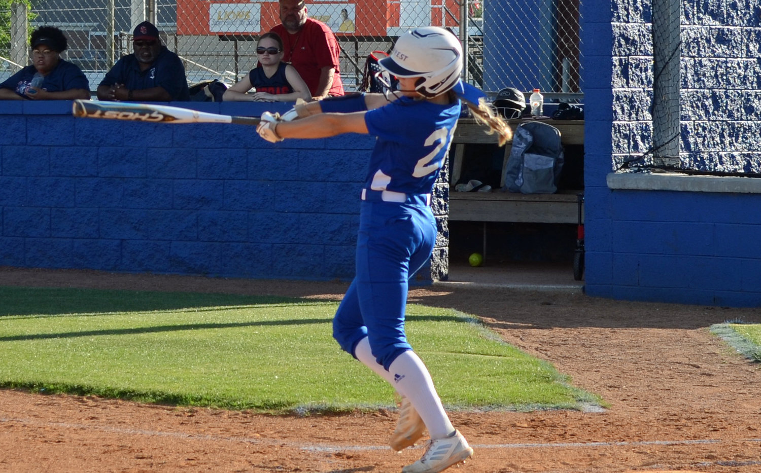 Maggie Daughrity slashes an inside the park home run in the bottom of the first inning. 