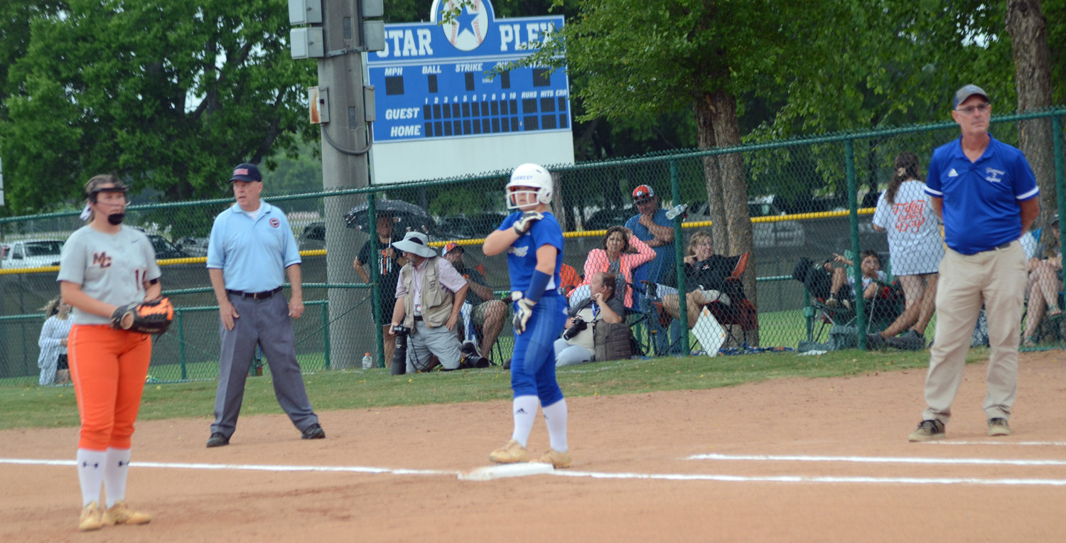 Christa Warren walked all three times she batted and scored twice for the Lady Rockets.
