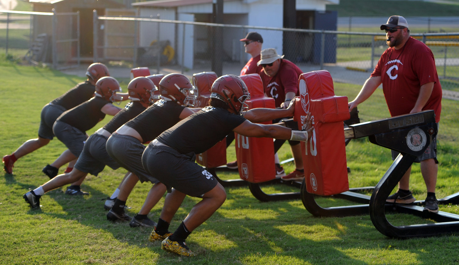 The Bulldogs work through a drill during summer practice.