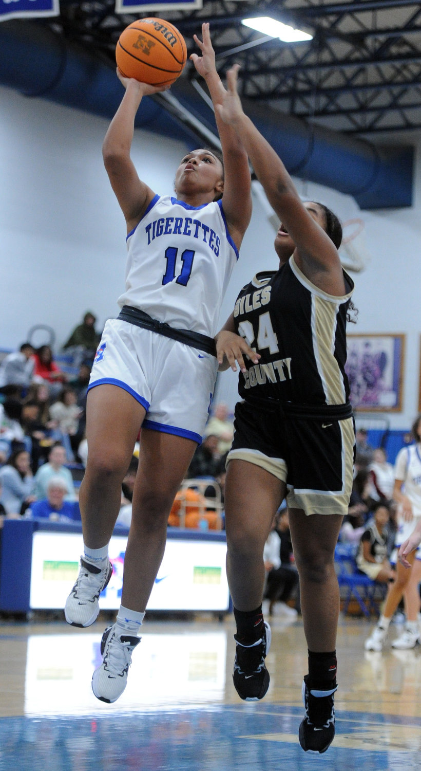 Demiyah Blackman is fouled as she goes up for two against Giles County.