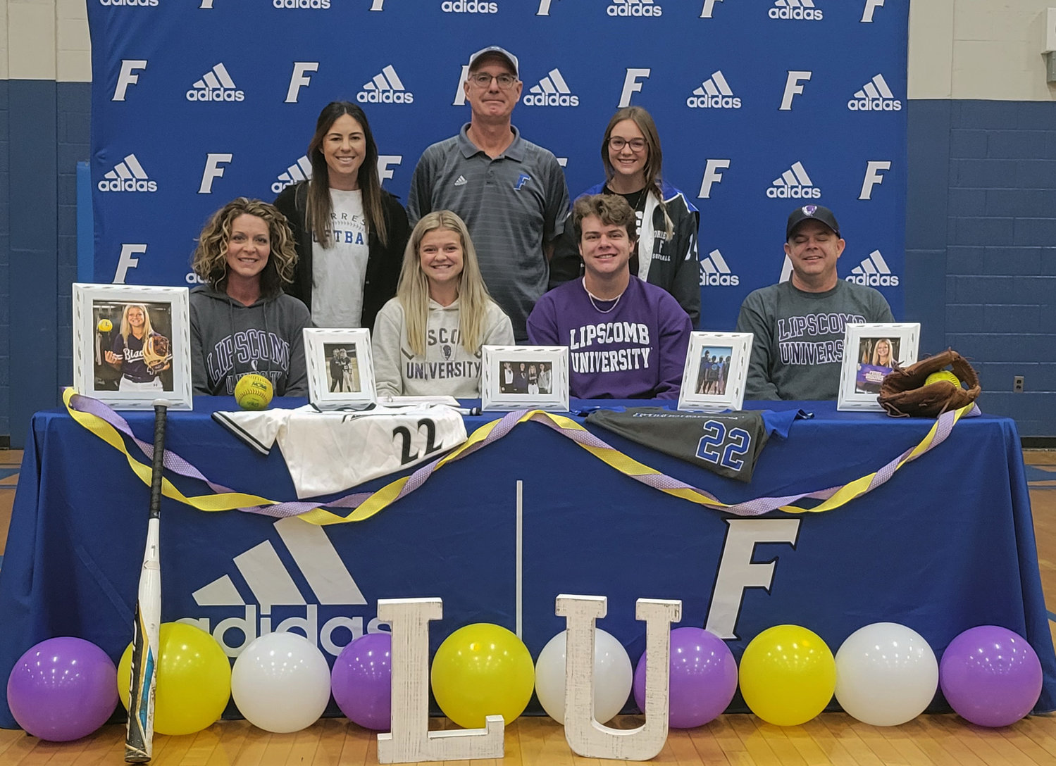 Macyn Kirby is all smiles as she signs her letter of intent to continue her softball career at Lipscomb University.
