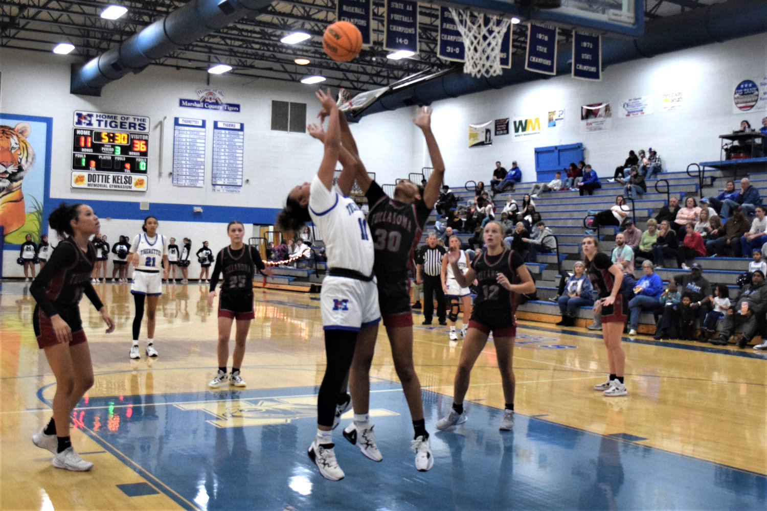 Demiyah Blackman (11) goes up for two for the Tigerettes.