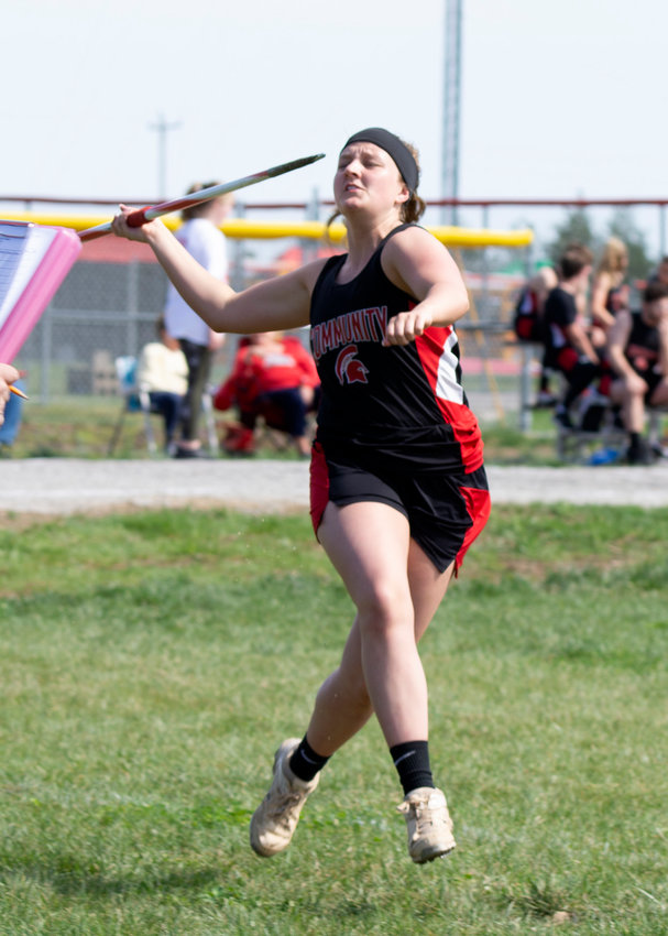 Emmi Johnson fires a javelin during Friday's track meet in Harrisburg. Johnson finished sixth in the event. [Leslie A. Meyer Photography]