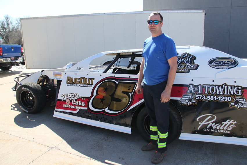 Mexico's Tyler Shaw with his winning ride outside of Ken's Fast Lube. Shaw works with his father at the garage all week and drives on Friday nights. [Dave Faries]