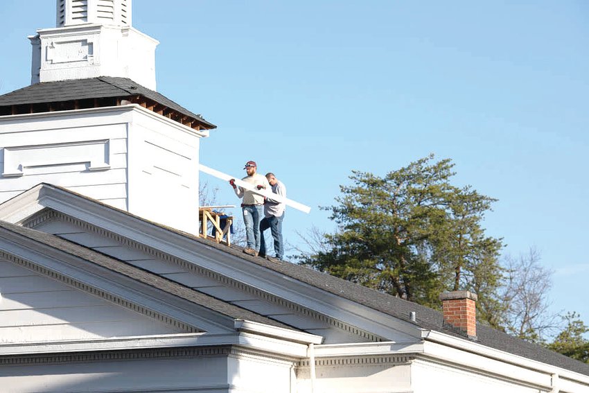 Missouri Military Academy maintenance staff makes final repairs on the Memorial Chapel steeple. [Submitted photo]