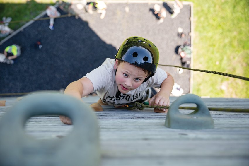 An MMA camper climbs MMA's 40-foot rock wall, Confidence Camp, summer 2020. [Submitted photo]