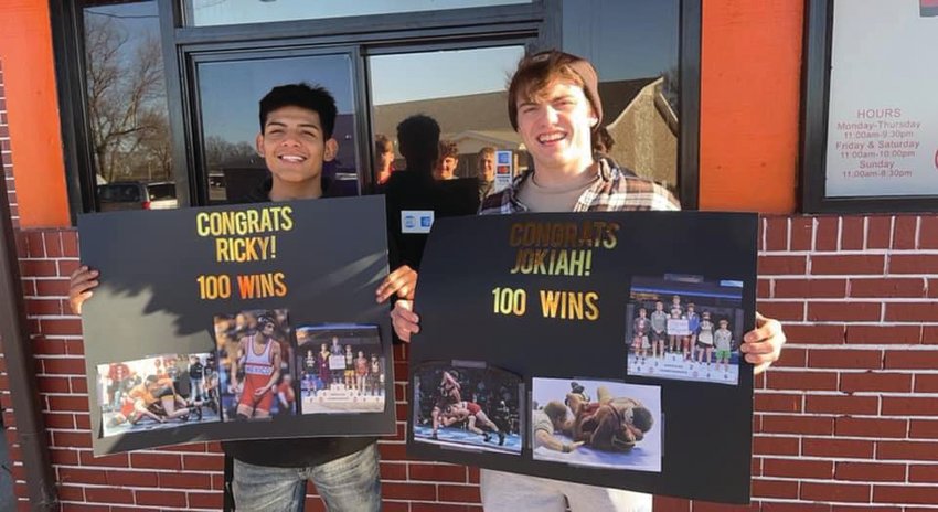 Ricky Juarez, left and Jokiah Sewell recently won their 100th match in their high school careers. [Photo courtesy of Mexico High School Facebook page]