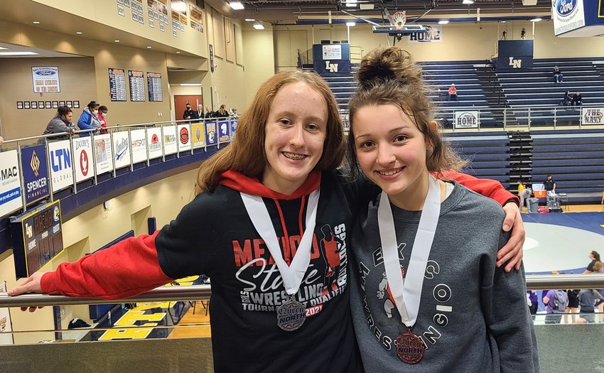 Katie Bowen finished second place in the 105-pound weight class and Kaylynn Pehle finished third in the 115-pound weight class at the Queen of the North Tournament on Saturday. [Photo courtesy Tony Senor]