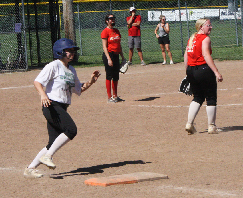 North Callaway's Brianna Prosser circles first base after hitting a home run June 22 during a summer league game the Ladybirds played in Centralia.