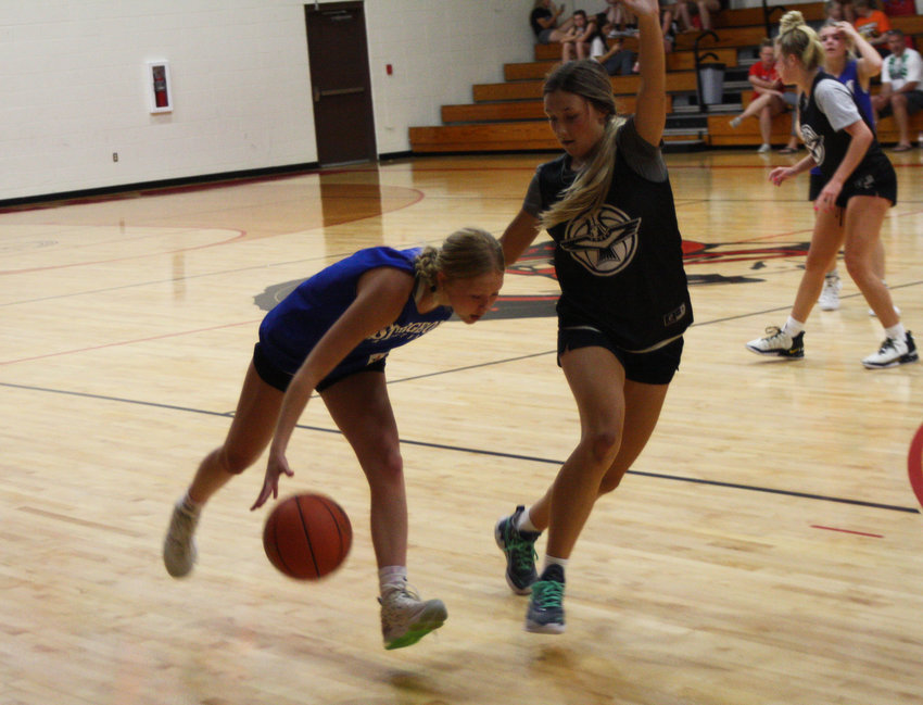 North Callaway's Lakyn Hartley defends Sturgeon on June 23 in a shootout at Community R-6 High School in Laddonia.