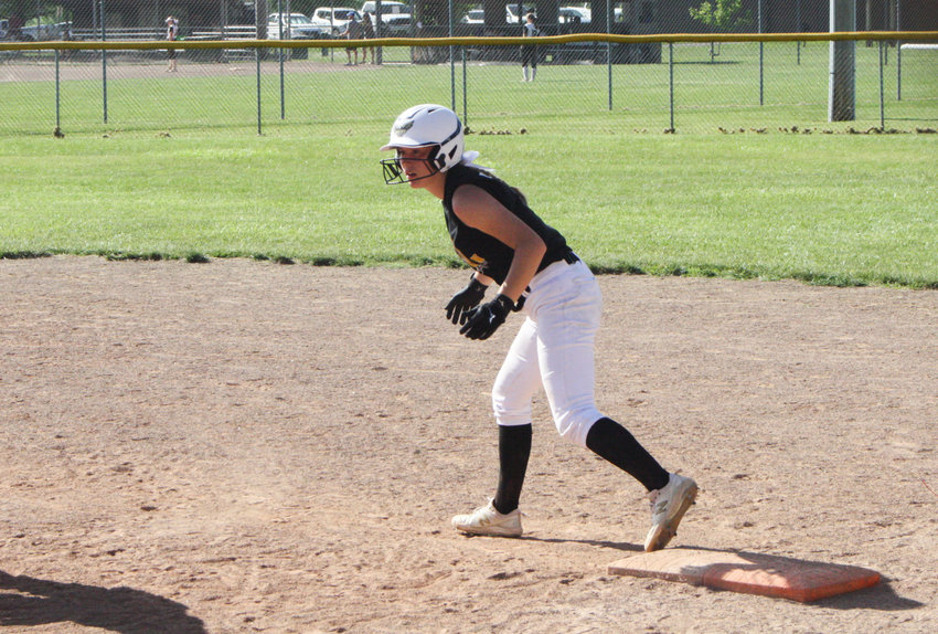 Van-Far junior Carmen Wilburn takes a lead from first base in a summer league game.
