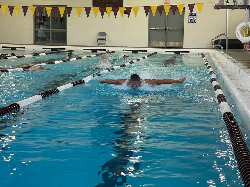 Missouri Military Academy swimmers work on the butterfly stroke during an early August practice.