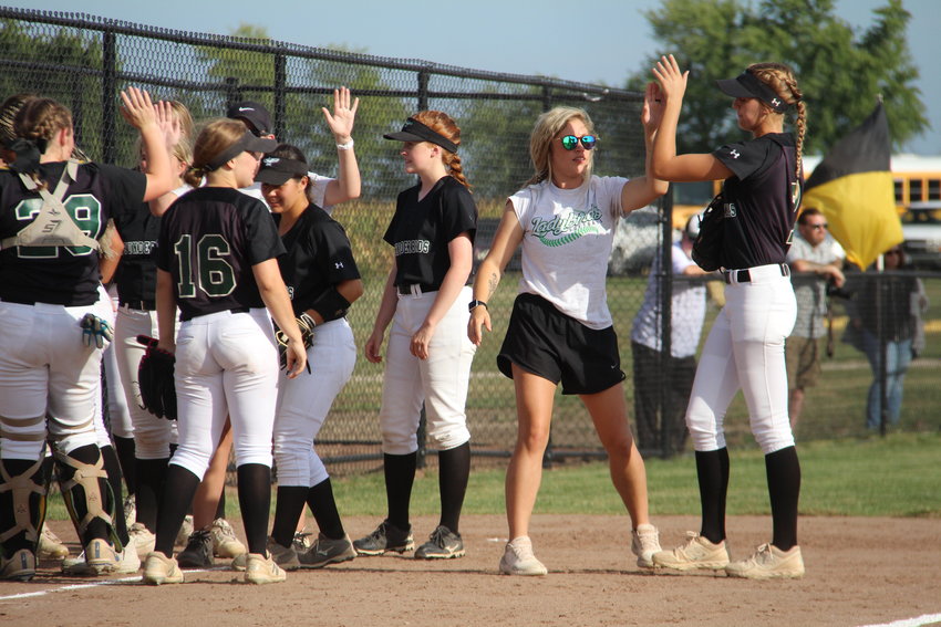 North Callaway celebrates Thursday after defeating Van-Far 15-4 in the first game on the Van-Far's new field.