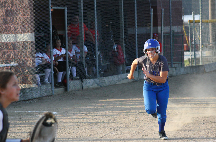 Paris senior outfielder Rachel Shoemyer approaches home plate Wednesday in the Lady Coyotes' 1-0 win in Laddonia.