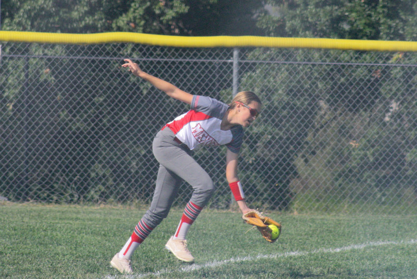Mexico junior right fielder Brooke Teel runs down a ball and catches it before it hits just inside the line Saturday morning in the team's 7-0 win at home against district opponent Winfield. The Lady Bulldogs defeated Boonville 6-0 in the afternoon to move back above .500.