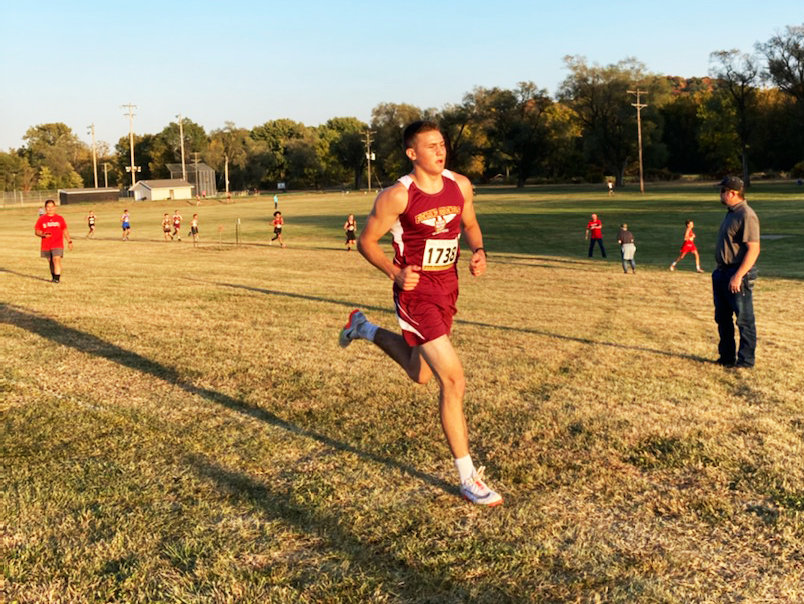 Missouri Military Academy senior Bryson Powell paces the field Monday at the Clopton Hamburger Meet in Clarksville. Powell won the boys' 5,000 meters, and the Colonels finished third as a team.