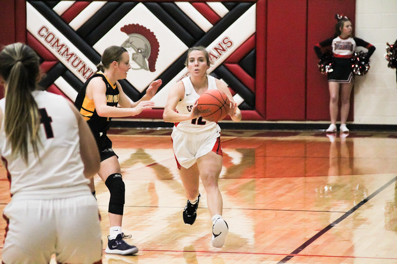 Community R-6 senior Sarah Angel makes a pass during the Lady Trojans' home game Nov. 22 against Wellsville-Middletown. Angel led the Lady Trojans with 21 points in a Monday night 60-54 win against Silex.