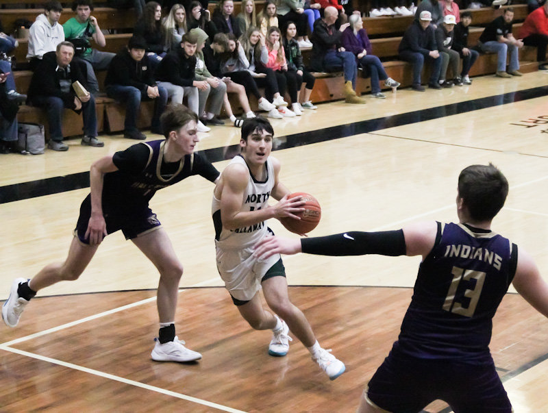 North Callaway junior Sam Pezold moves toward the rim Saturday during the Thunderbirds' 67-49 loss to Hallsville in the Centralia Invitational Tournament. Pezold finished the game with 11 points but averaged 18 points in three games this week to make the all-tournament team.