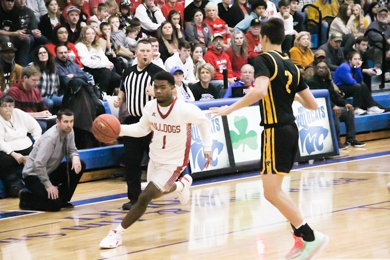 Mexico senior Anthony Shivers takes the ball in transition Dec. 3 against Fulton. Shivers finished with a team-high 29 points to earn the MVP award in Mexico's three-overtime 85-82 victory against state-ranked Strafford on Saturday in its 48 Hours of Basketball Springfield game.