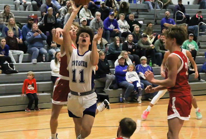 Paris senior Mason Edwards drives to the basket Nov. 18 at home against Marion County. Edwards scored 12 points behind a 20-point, 14-rebound performance from Alex Williams in a 66-36 win Tuesday at home against Marceline.
