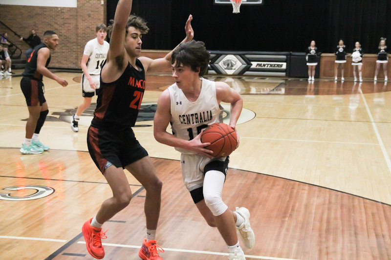 Centralia junior Noah Kropf makes a move in a Dec. 6 game against Macon. Kropf scored 14 points Tuesday in a 44-38 victory at California.