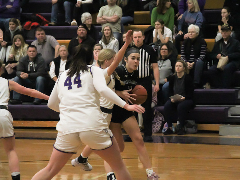 North Callaway sophomore Natalie Shryock drives against the Hallsville defense on Tuesday in a 42-34 loss in Hallsville. Shryock had seven assists to go with seven points in the close loss for the Ladybirds.