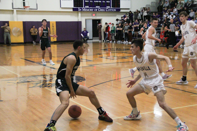 North Callaway senior Matthew Weber handles the ball Dec. 27 at Hallsville. Weber led the Thunderbirds to a decisive win at New Bloomfield.