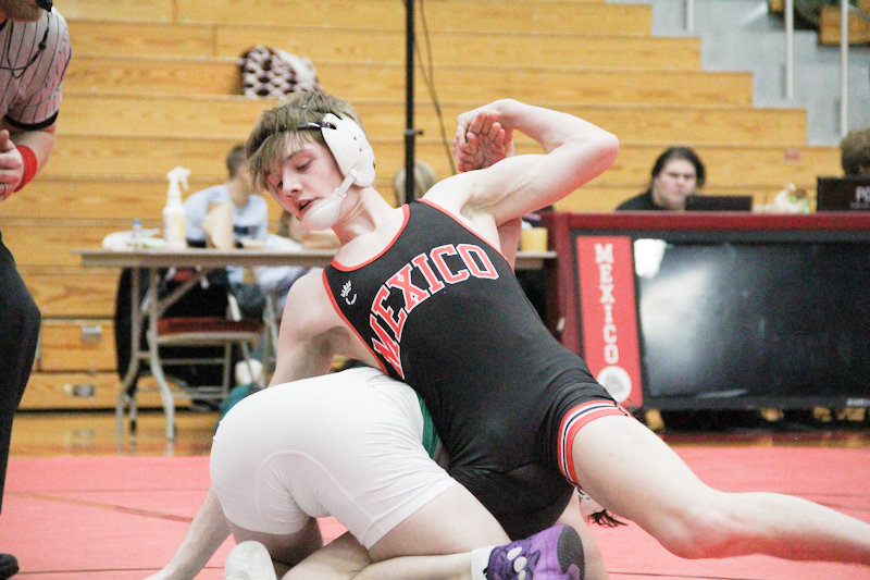 Mexico sophomore Grant Van Horn holds Blair Oaks' Nolan Laughlin in place on Saturday during Mexico's home duals meet. Van Horn won four matches and the Bulldogs split their four duals before districts two weeks later.