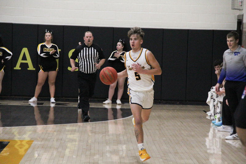 Van-Far senior Cody Smith advances the ball down the court against Montgomery County on Jan. 31 at home.