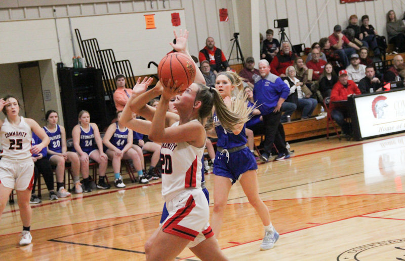 Community R-6 junior Kylie Brooks shoots a layup Tuesday against Sturgeon at home. Brooks has proven to be a dominant force against the Lady Bulldogs, finishing with double-digit rebounds in all three games against them this season and leading the Lady Trojans with 24 points and 15 rebounds on Tuesday.