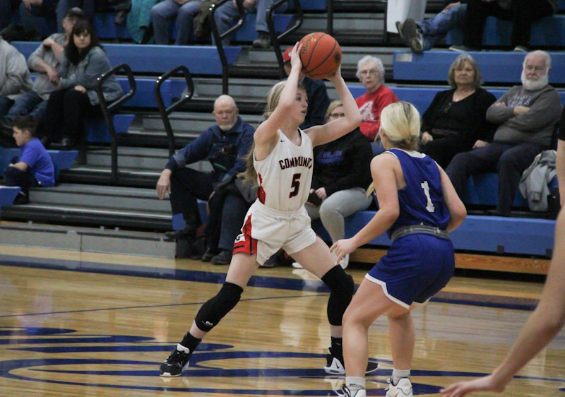 Community R-6 freshman Peyton Beamer looks for an open teammate on Jan. 25 against Sturgeon. Beamer hit a couple of key free throws in a narrow victory Friday at Glasgow.