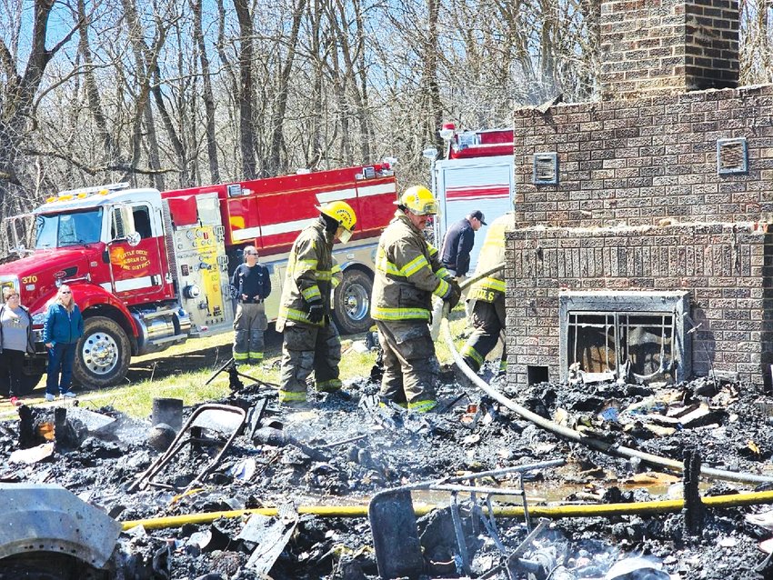 Two area residents and their pet perished in a weekend fire. [Submitted]