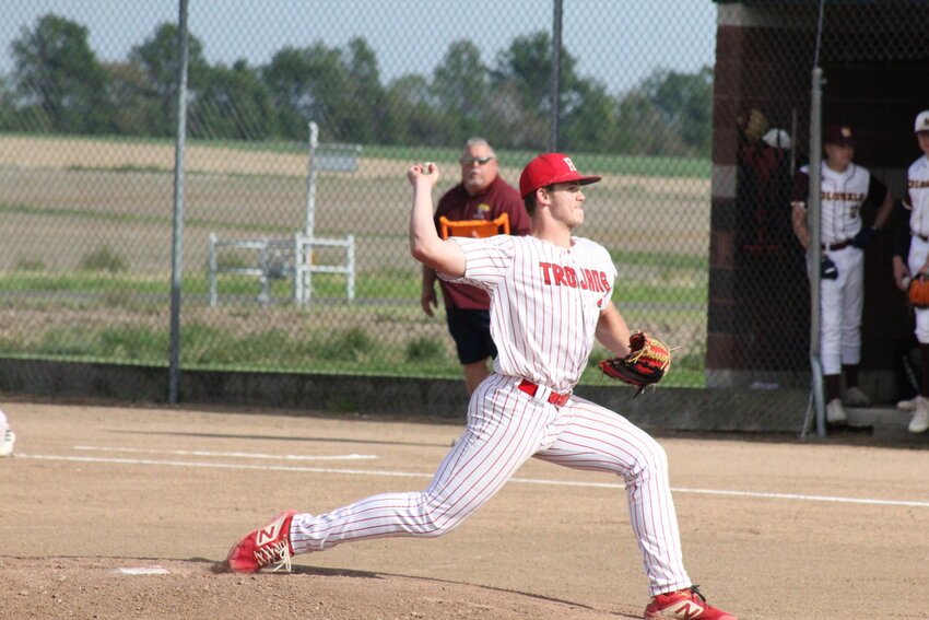 Community R-6 junior Mason Carroll pitches against Missouri Military Academy on Tuesday at home.