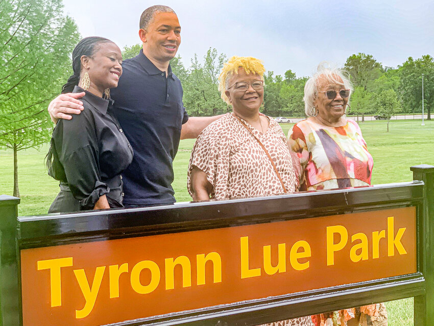Los Angeles Clippers Head Coach Tyronn Lue took a photo with from left, sister Shakea (Toi) Lue, mother Kim Lue and grandmother Olivia George with the new sign at Tyronn Lue Park, formerly Garfield Park on Sunday, May 14.