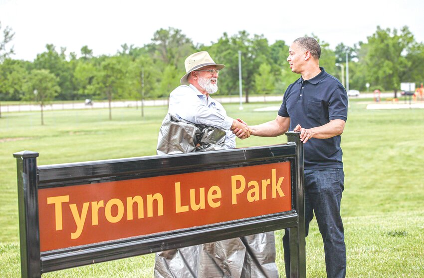 Los Angeles Clippers Head Coach Tyronn Lue, right, got a congratulations from Mexico Parks and Recreation Director Chad Shoemaker after Lue unveiled the new sign to Tyronn Lue Park, formerly Garfield Park, on Sunday, May 14.