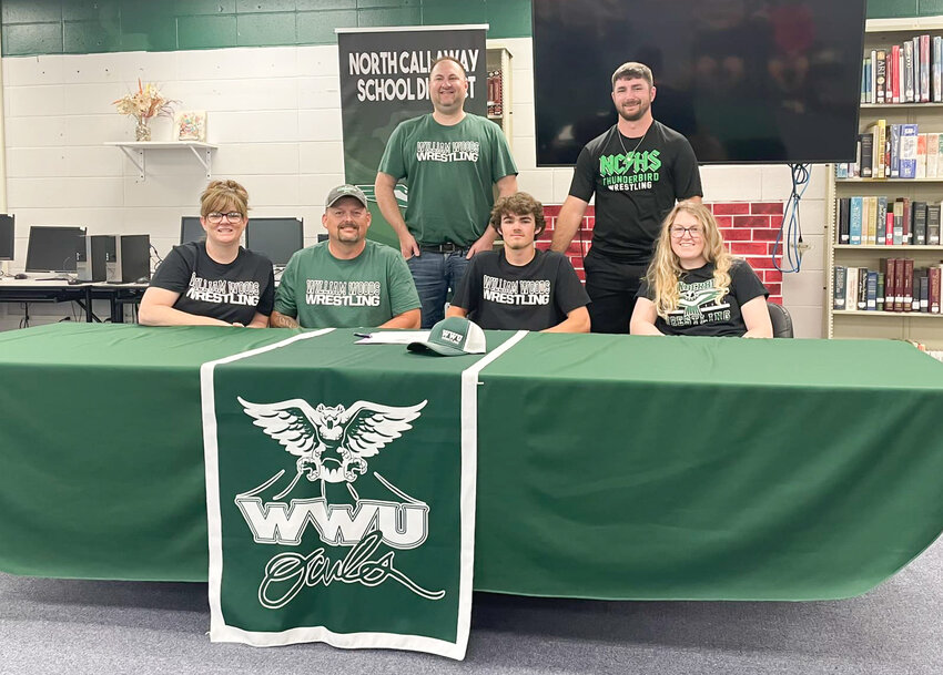 North Callaway junior and three-time state medalist Lane Kimbley signed with the new William Woods wrestling program last week.
