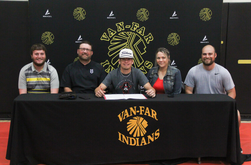 Van-Far senior Cody Smith is surrounded by his family and coaches on May 11 at the high school during his college signing ceremony to North Central Missouri College in Trenton. Smith played in the Class 1 state meet earlier in the week.