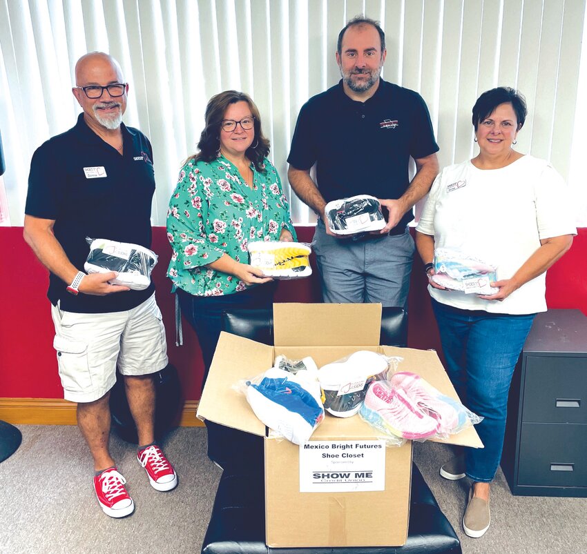 Donnie Bonuchi, Shoes from the Heart, Christina McCaw, Bright Futures Mexico School-based Coordinator, Kent Groves, Show Me Credit Union President, and Gina Fowler, Shoes from the Heart met at the Central Office on Tuesday, Oct. 3, for the shoe donation.