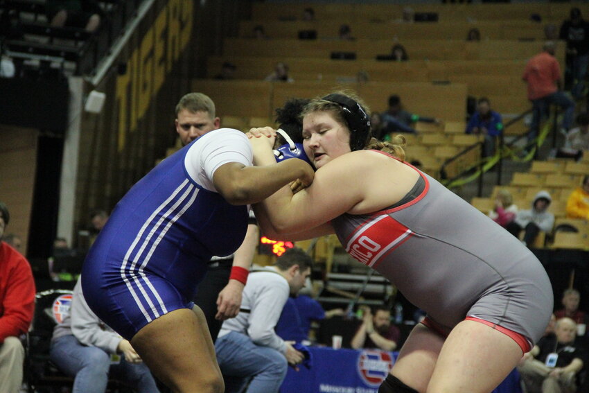 Mexico sophomore Alexus Johns ties up with an opponent last season at her first career state wrestling championships.