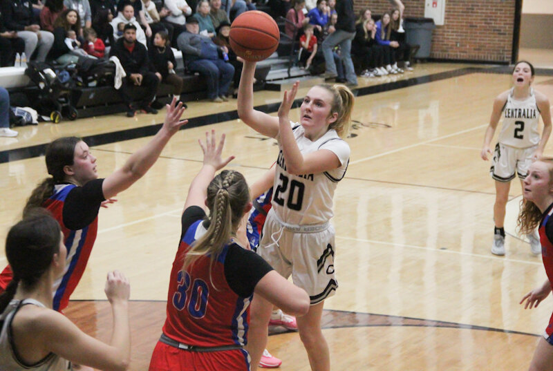 Centralia sophomore Braylin Brunkhorst shoots over the Moberly defense on Friday during the Centralia Invitational girls championship game.