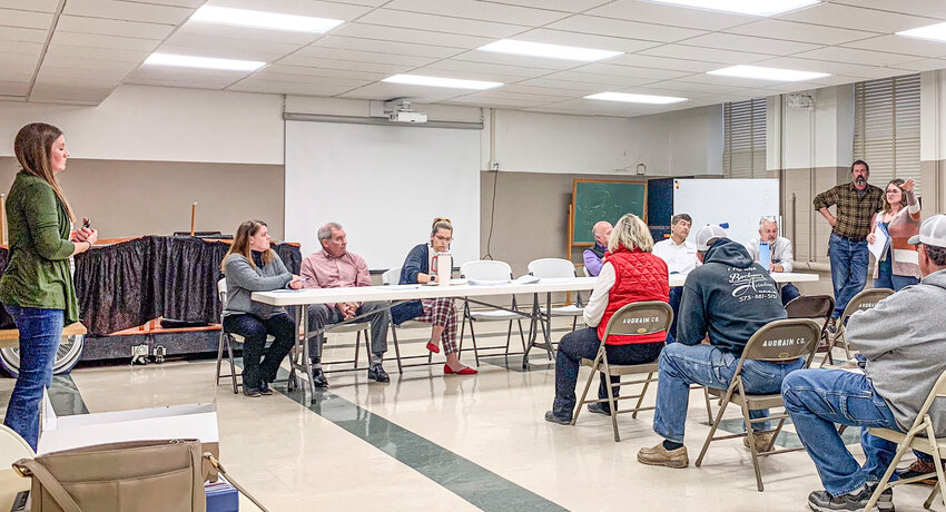 Nakila Blessing, standing left, and Carrie March, standing right, visited Audrain County earlier this month to talk about windmills. [Dennis Sharkey]