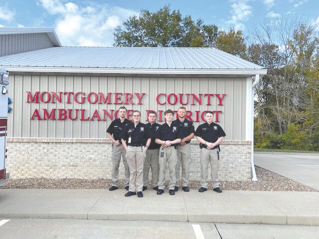 Graduates from the Missouri Sheriff&rsquo;s Association 48-hour Jail Academy pose in front of the Montgomery County Ambulance District. They were Ben Rajchart of Montgomery County, Ashton Dyke of Van-Far High School, Monica Bourne, Zachary Kirks, Brian Hawkins and Daniel Gerloff.