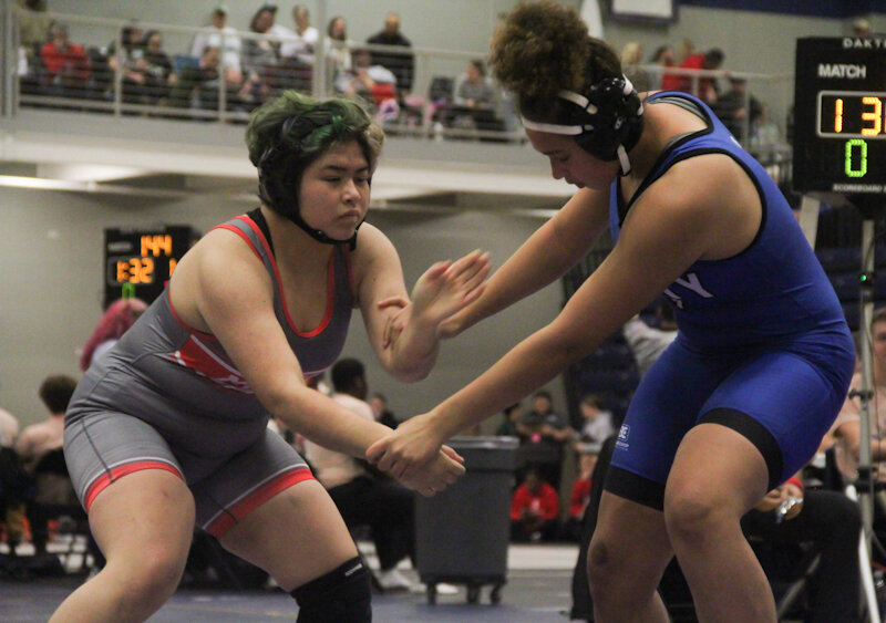 Mexico senior Karisa Hayden fends off her opponent's offense last month during the Wonder Woman tournament at Battle High School in Columbia.